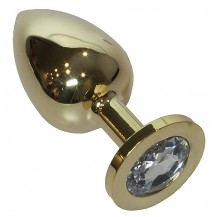 a gold plated butt plug in 24k gold. With a crystal end piece.